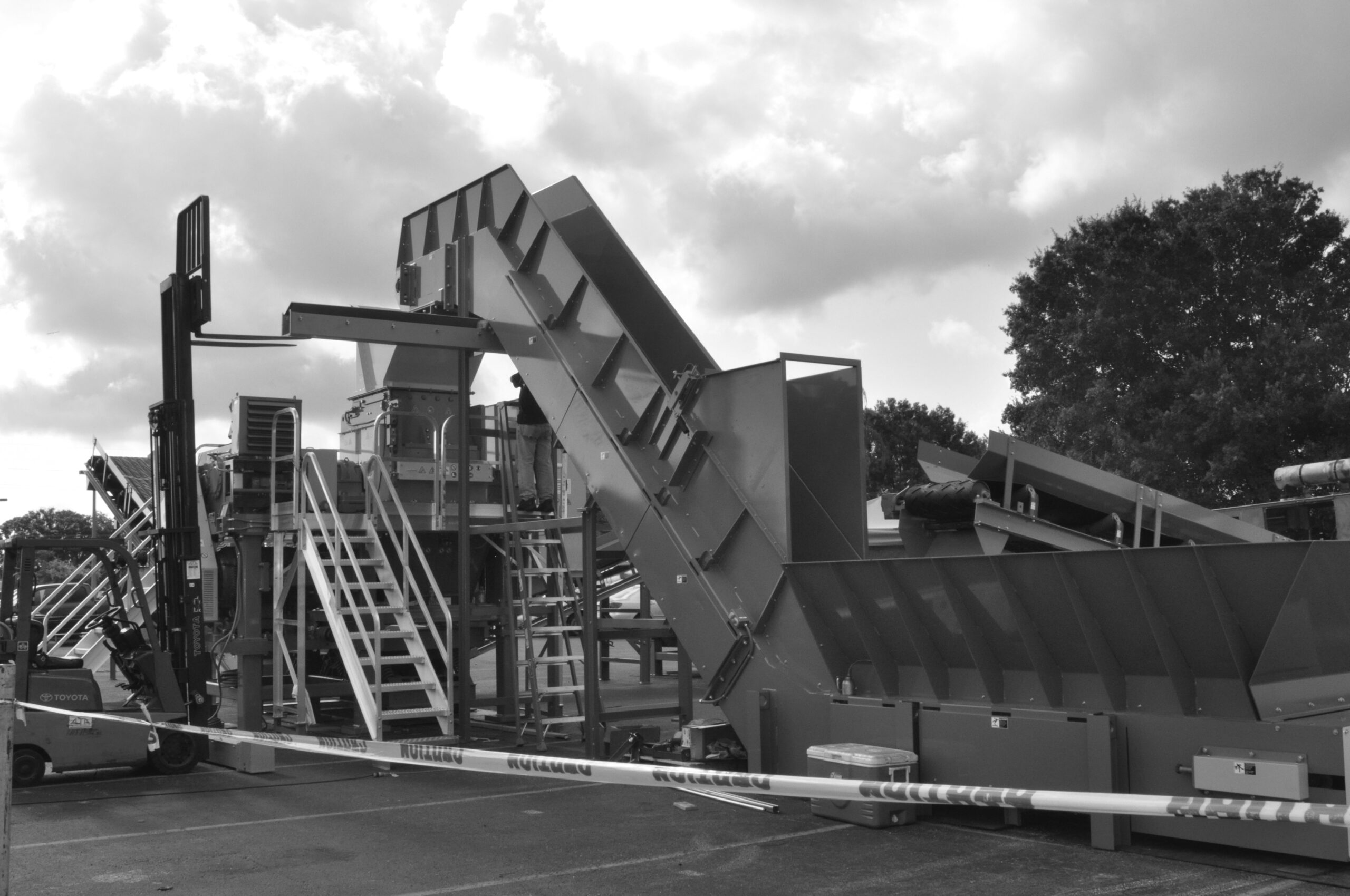 TUMBLE BACK CONVEYOR SYSTEM